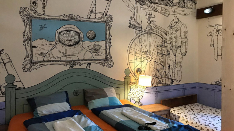 large astronaut mural in room