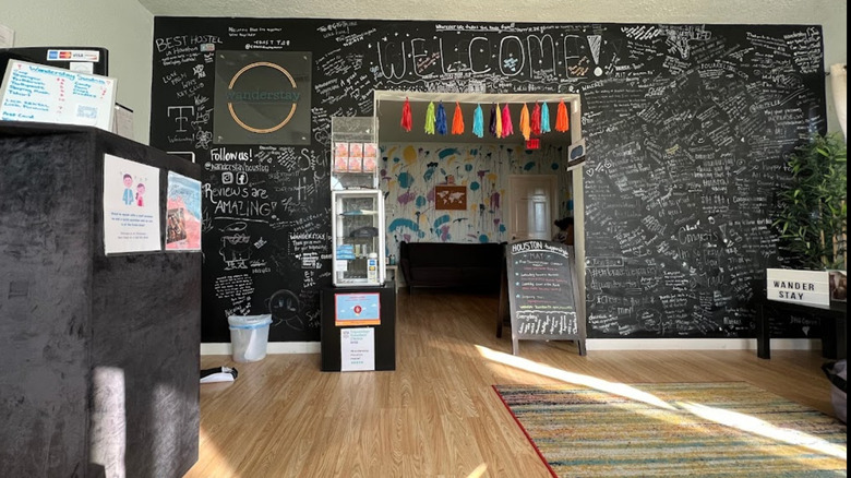 Wanderstay's chalkboard welcome wall