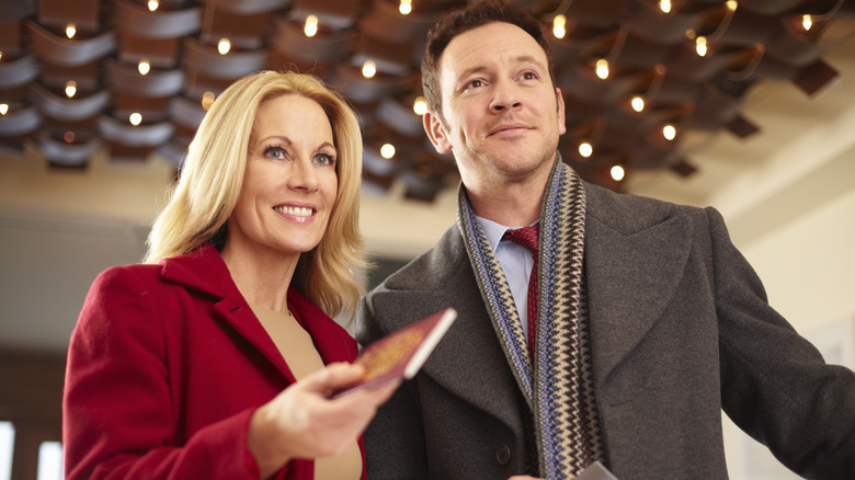 Happy couple with passports