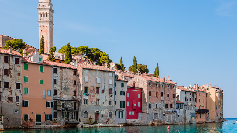 Pastel homes line the waterfront of Rovinj, Croatia