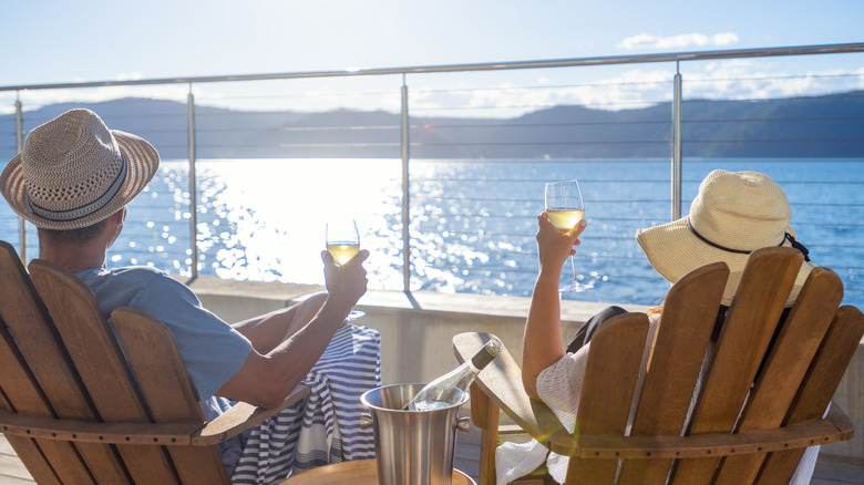 couple relaxing on deck cruise ship