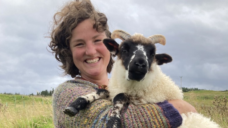 Guest with sheep during cruise port