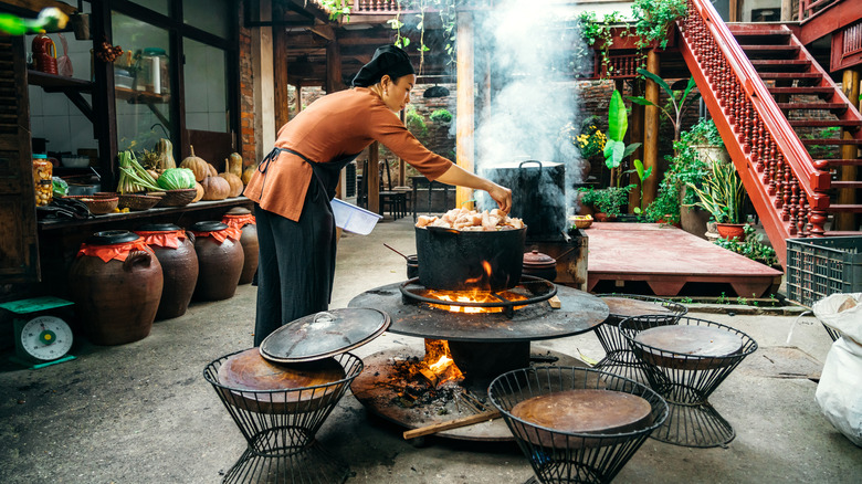 Chef cooking outside in Vietnam 