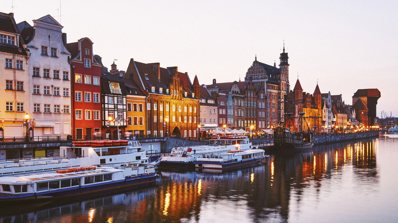 colored buildings along canal