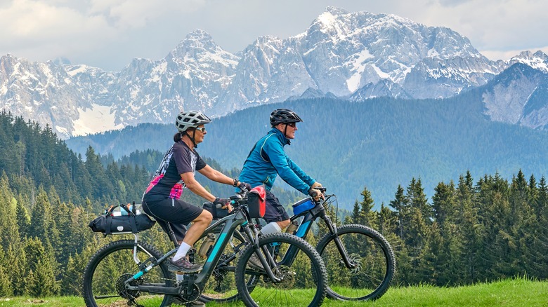 two mountain bikers in mountains