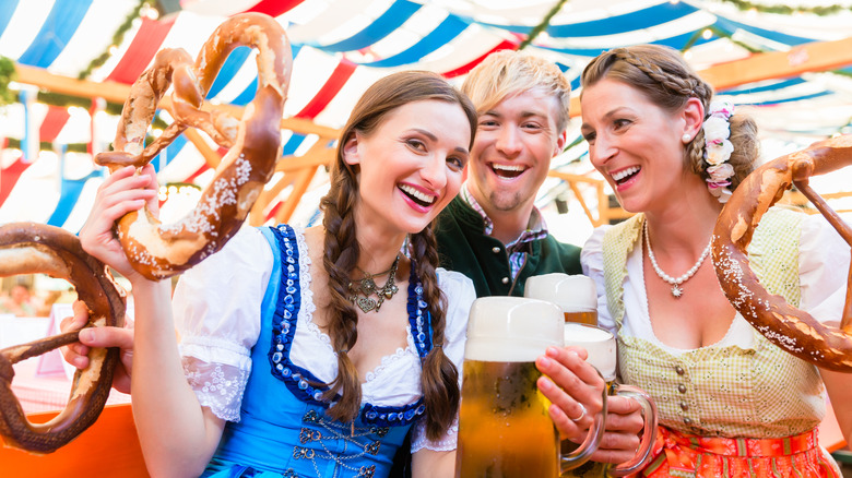 Visitors in Bavarian clothing at Oktoberfest 