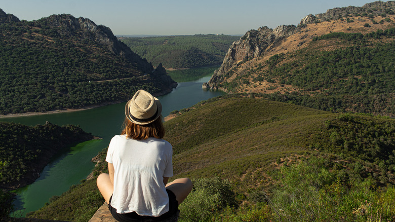 Woman overlooking landscape of Monfragüe