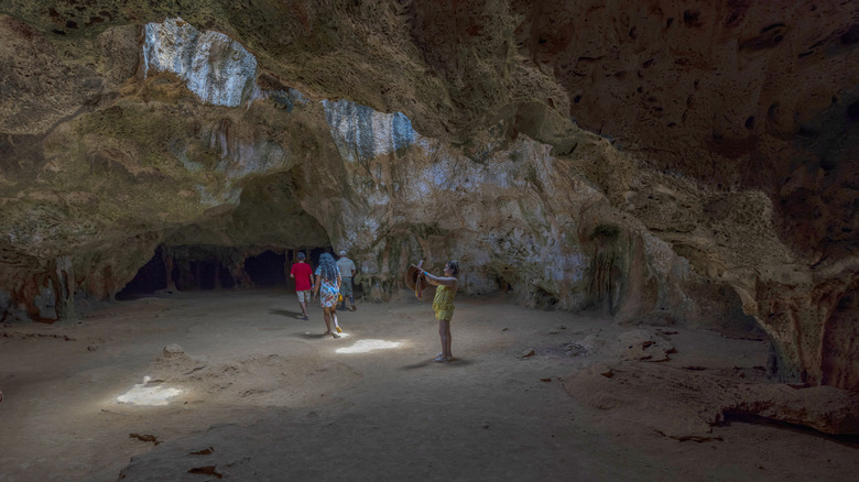 Group in Guadirikiri Cave in Arikok National Park, Aruba