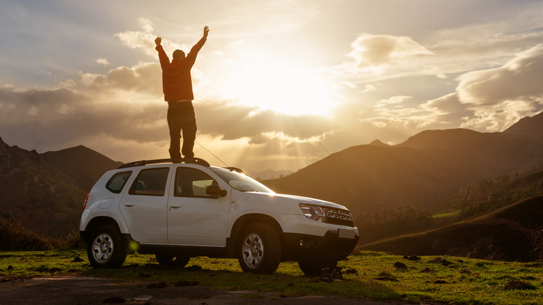 Person with arms raised 