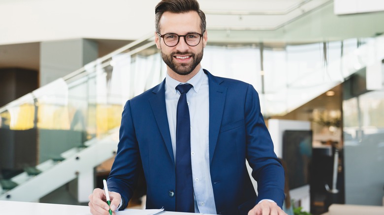 rental car agent with pen