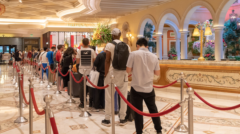 Waiting in line at hotel check-in