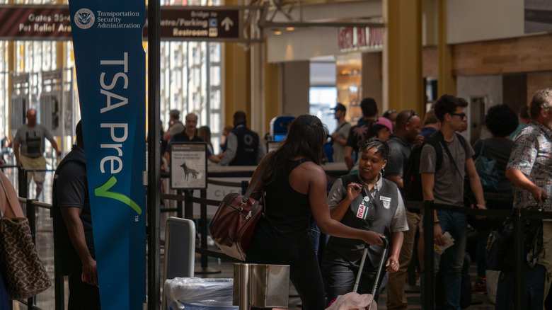 An airport security line with TSA Precheck designation