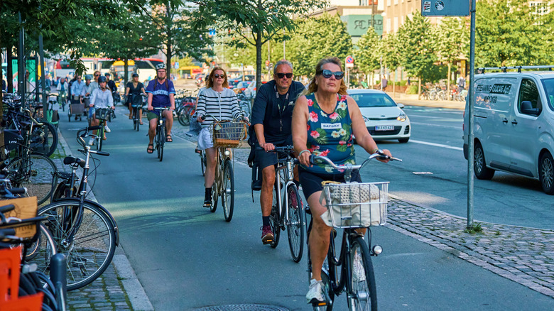 Cyclists pedal down a bike lane in Copenhagen