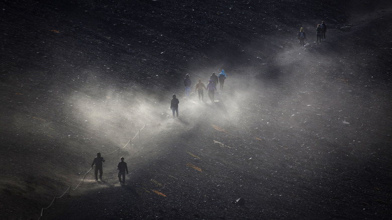 Hikers trekking to Hverfjall crater