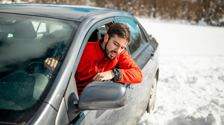 driver stuck in snow