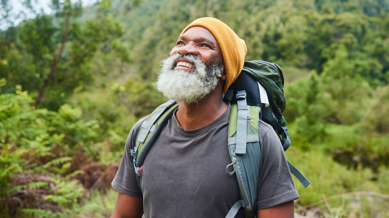 smiling man during hike