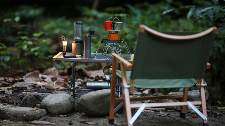 a campsite chair and coffee gear