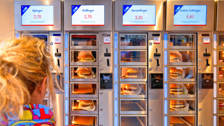 A woman peruses the selection at a local FEBO in Amsterdam