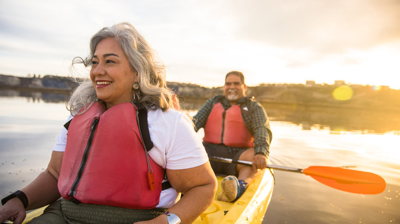 Elderly couple kayaking