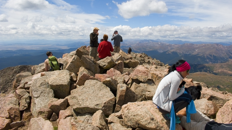 hikers on a rocky summit