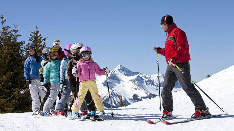 Children skiing with an instructor