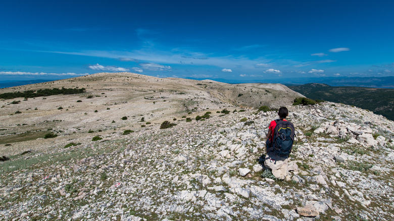 hiker siting at Obzova peak