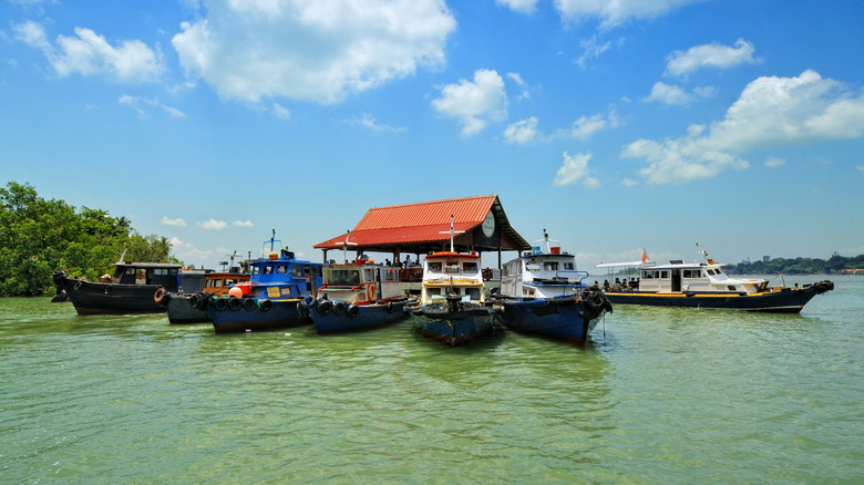 Boats docked at Pulau Ubin pier