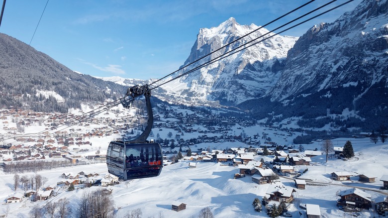 Gondola above snow-covered Wengen