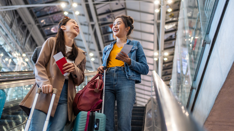 Two women excited for their trip to Europe