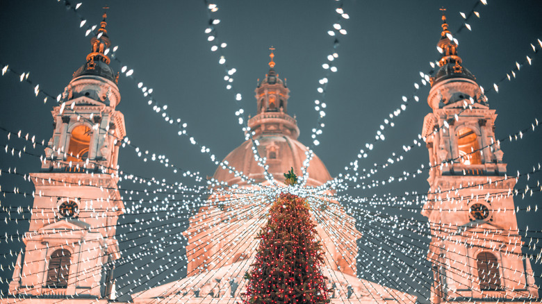 Christmas tree and basilica with lights