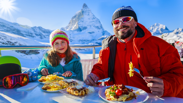Family eating near Matterhorn.