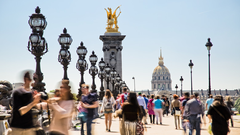 People walking on a bridge