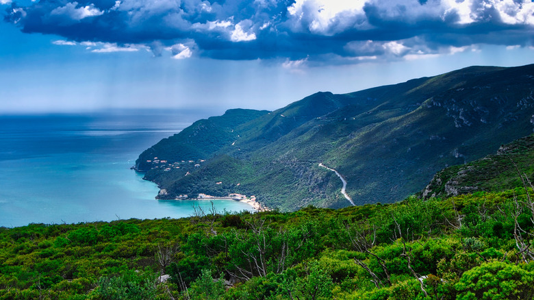 View over ocean and lush mountains at Parque Natural da Arrábida