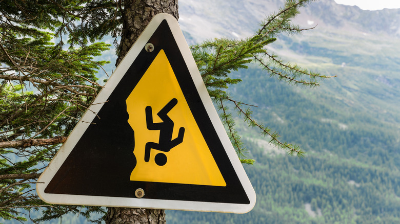 Danger sign on hiking trail