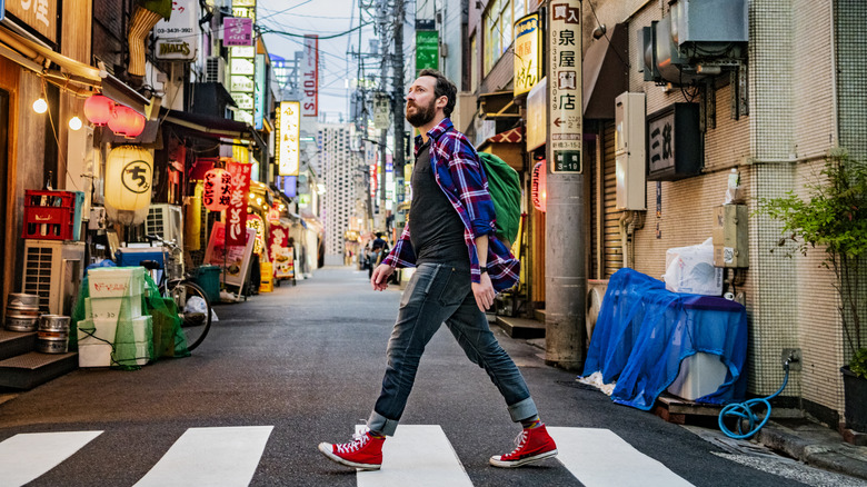 tourist walking in Japanese city