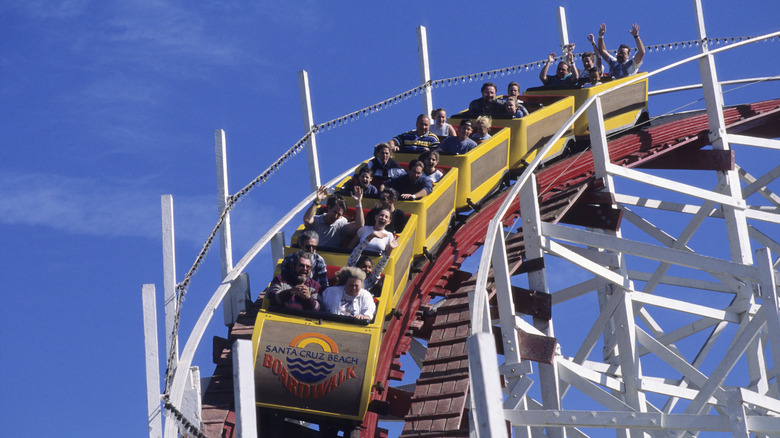 wooden roller coaster screaming people