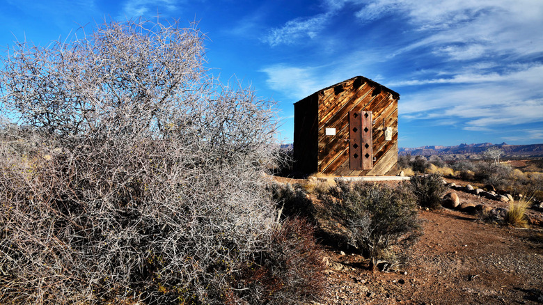 old wooden jailhouse in desert