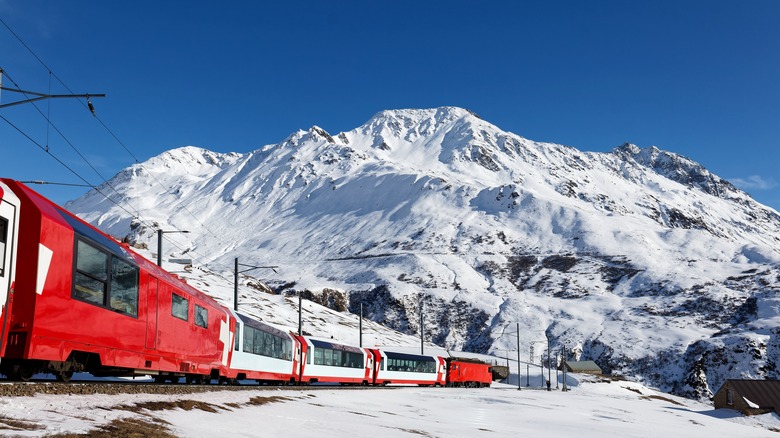 Train traveling through Swiss Alps