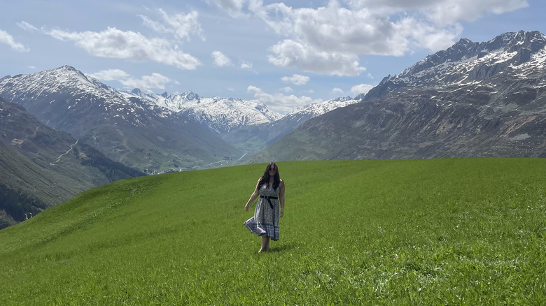 girl frolics in Swiss Alps