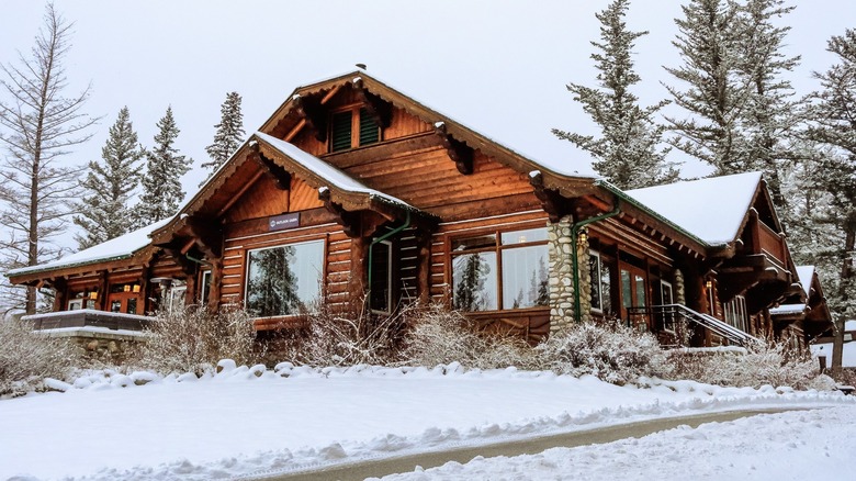 Log cabin in the snow