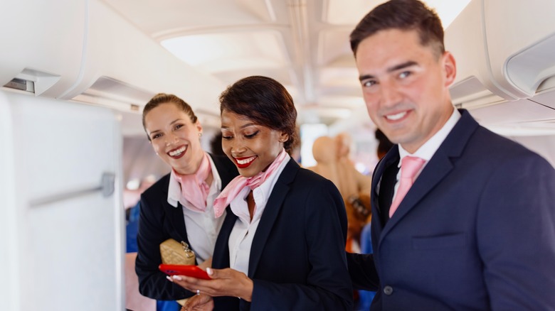 Smiling flight attendants