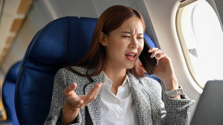 Angry passenger on phone
