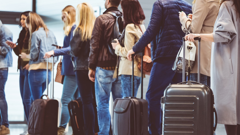 passengers lining up for flight