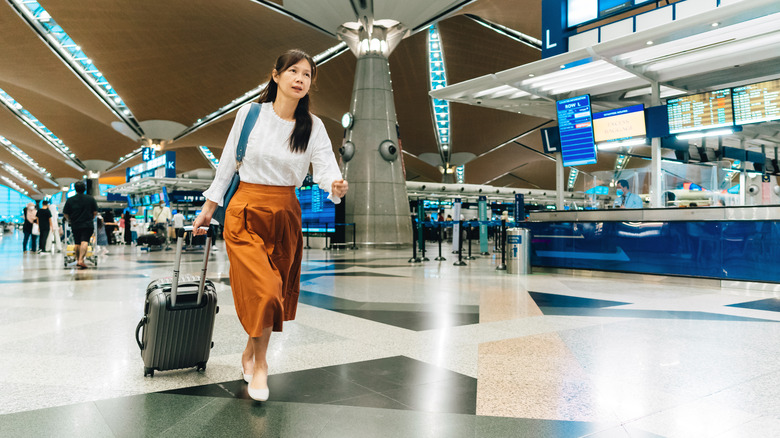 Woman running in airport