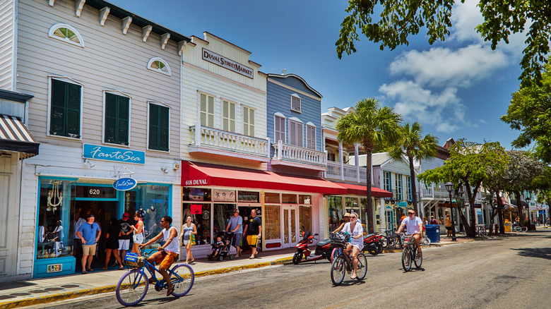 Biking down Duvall Street in Key West