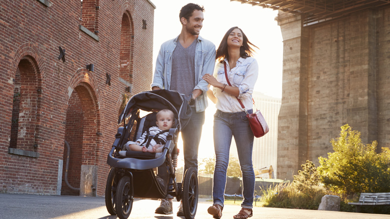 Family with stroller on vacation 