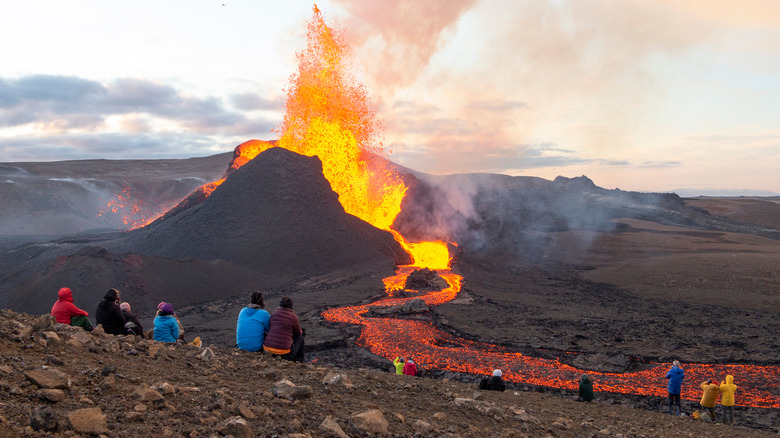 People watching volcanic eruption