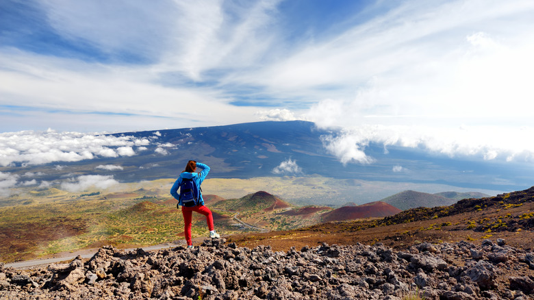 Hiker looking at Mauna Loa