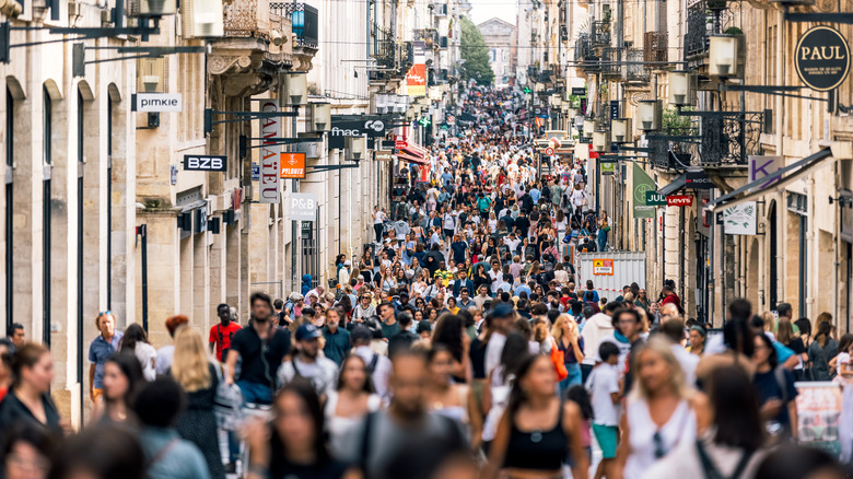 Crowds of people walking in Paris, France