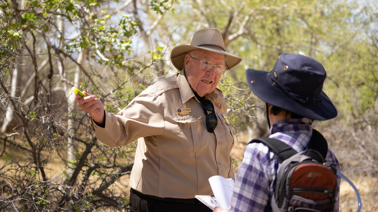 Volunteer giving directions Montezuma Castle Arizona